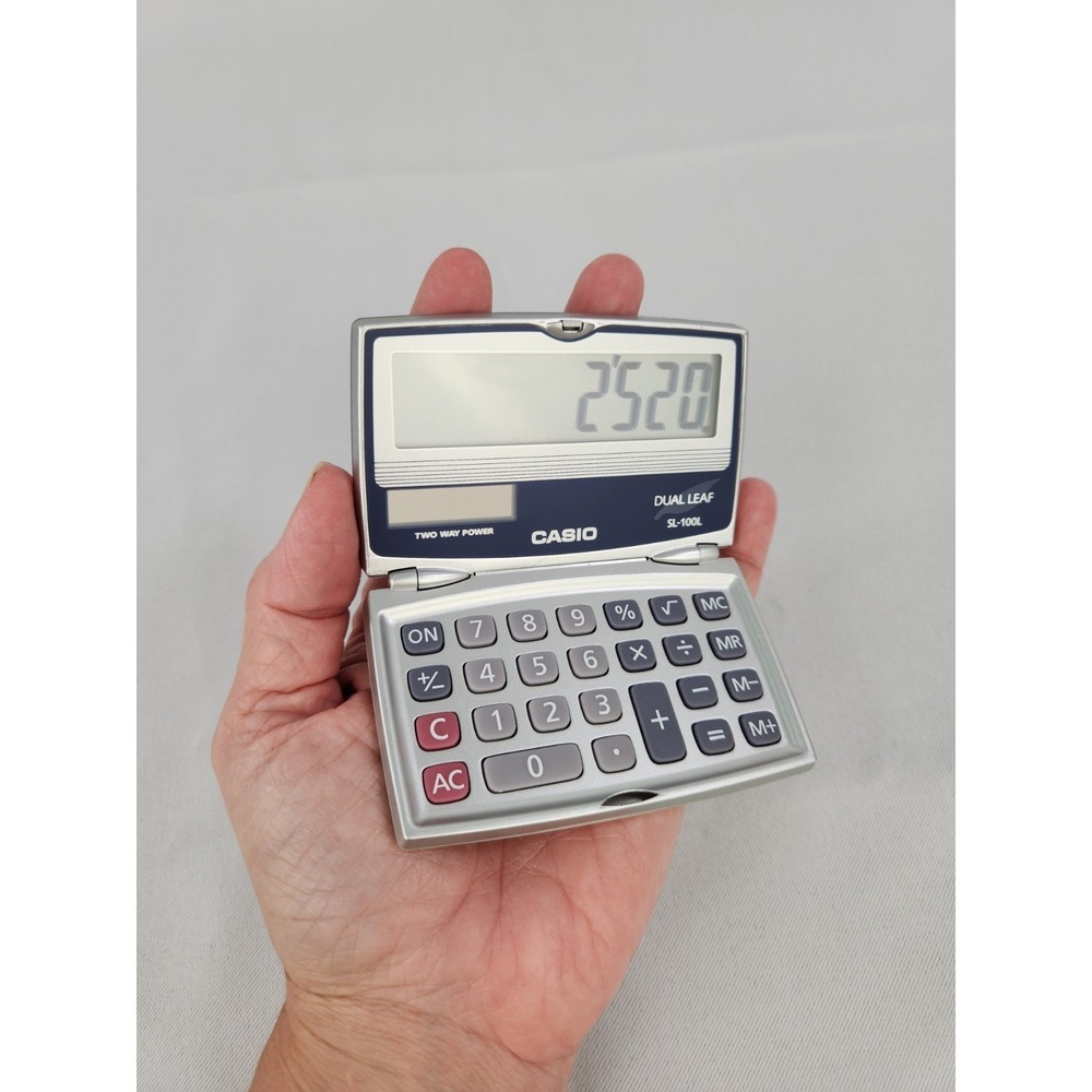 Vintage Casio SL-100L Dual Leaf Basic Solar Folding Compact Calculator Tested